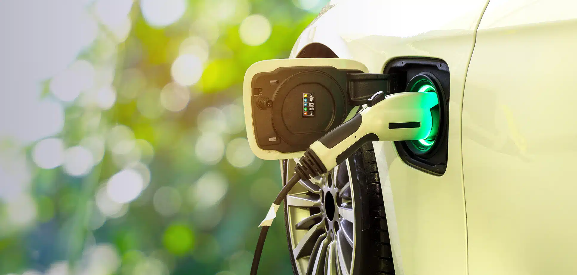 EV charger plugged into car